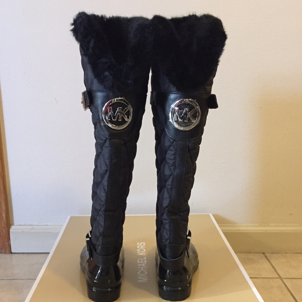 Michael Kors rain boots never worn.