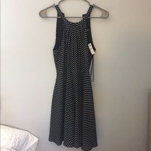 Black polka-dot dress