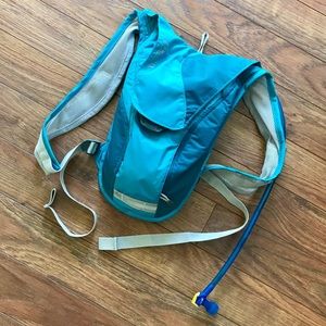 CamelBak portable hydration pack, 50 oz, teal