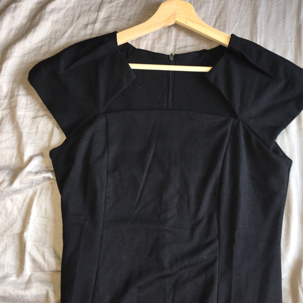 Black knee length dress. Perfect for the office!