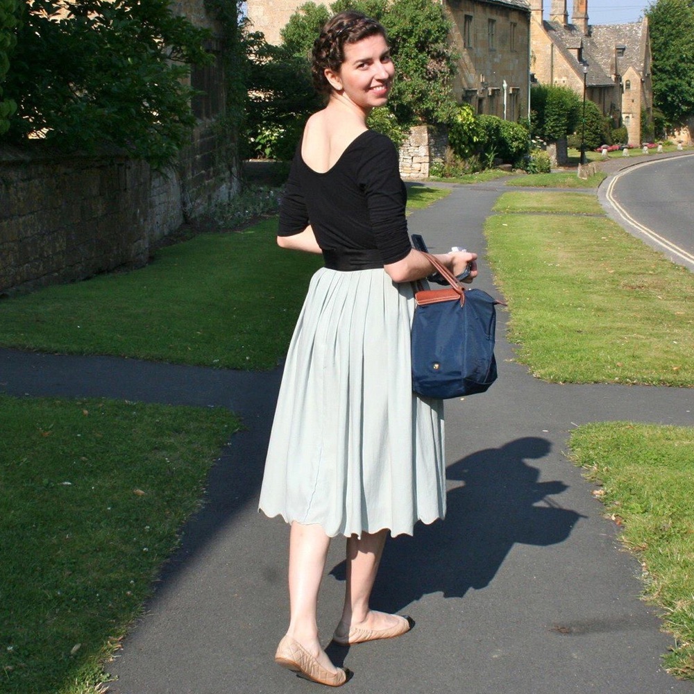 H&M dusty green midi skirt with black waist band