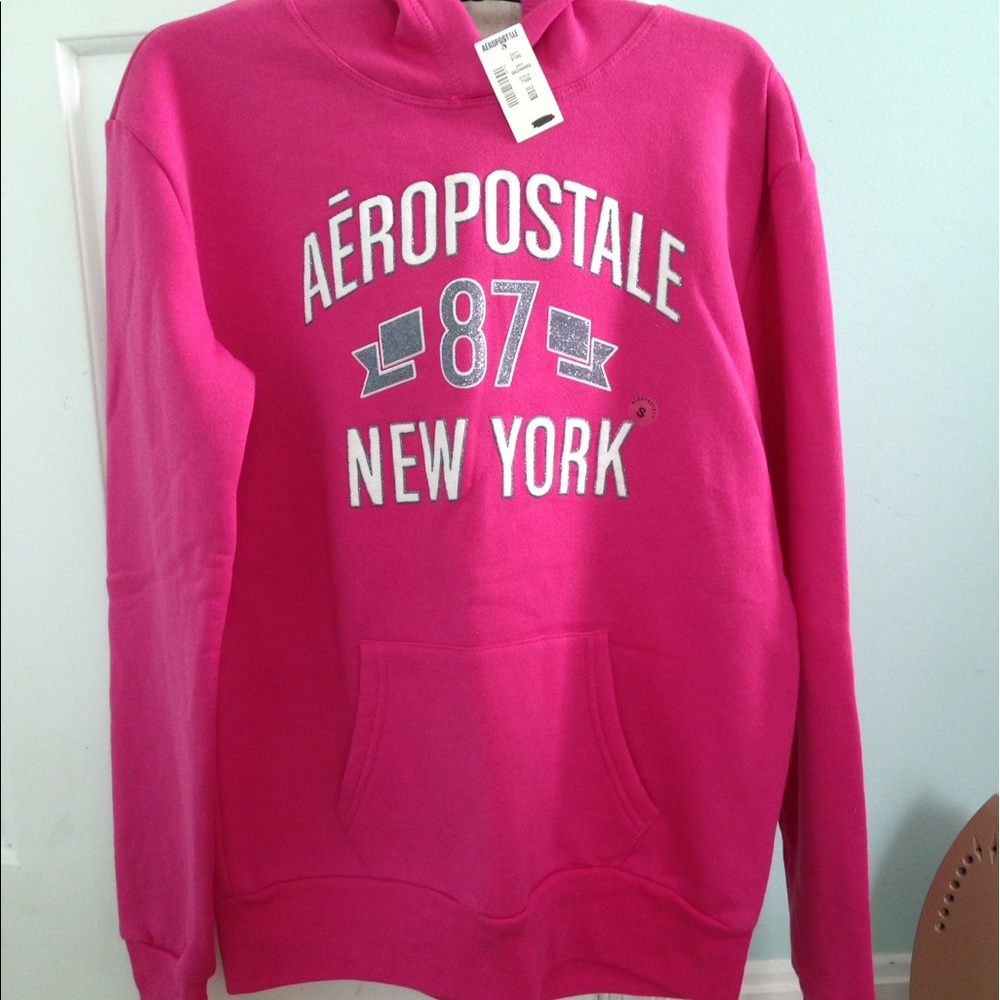 A hot pink very comfortable furry sweater
