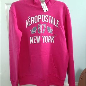 A hot pink very comfortable furry sweater