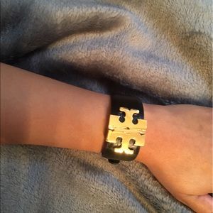 Tory burch black and gold bracelet.