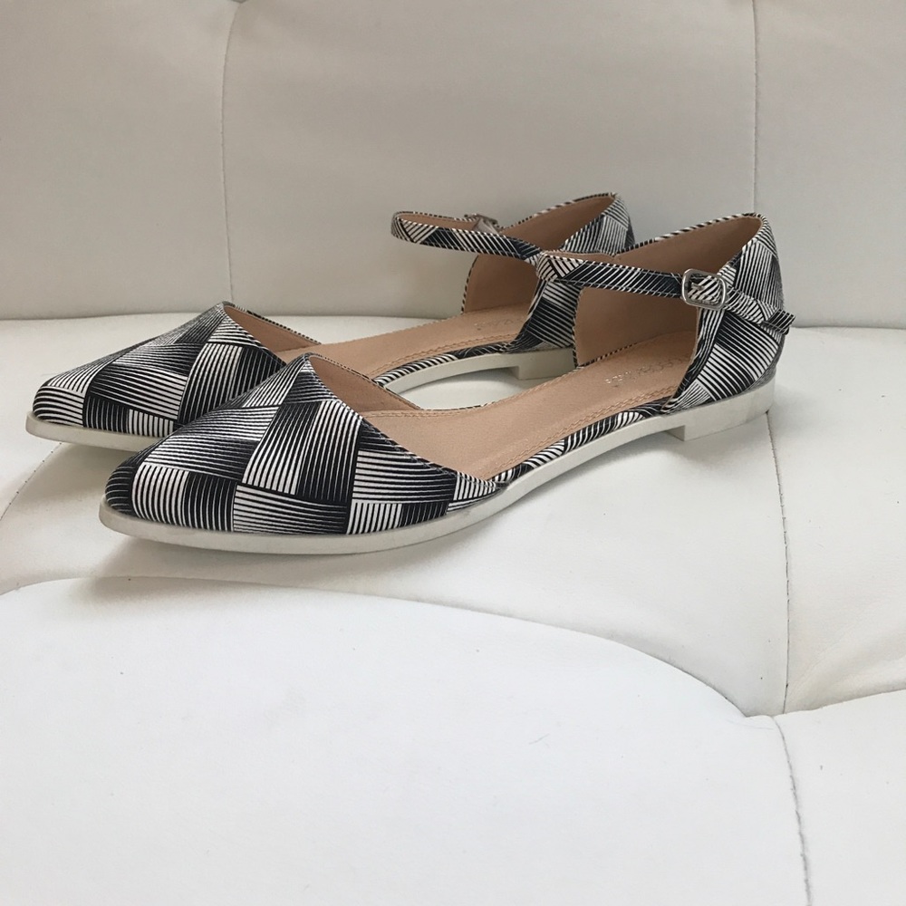 Black and white patterned flats