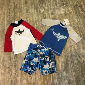 Swim shorts and rash guard.
