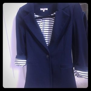 Navy blazer with white and blue details