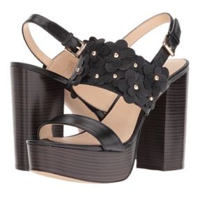 Black chunky heels. NEVER WORN.