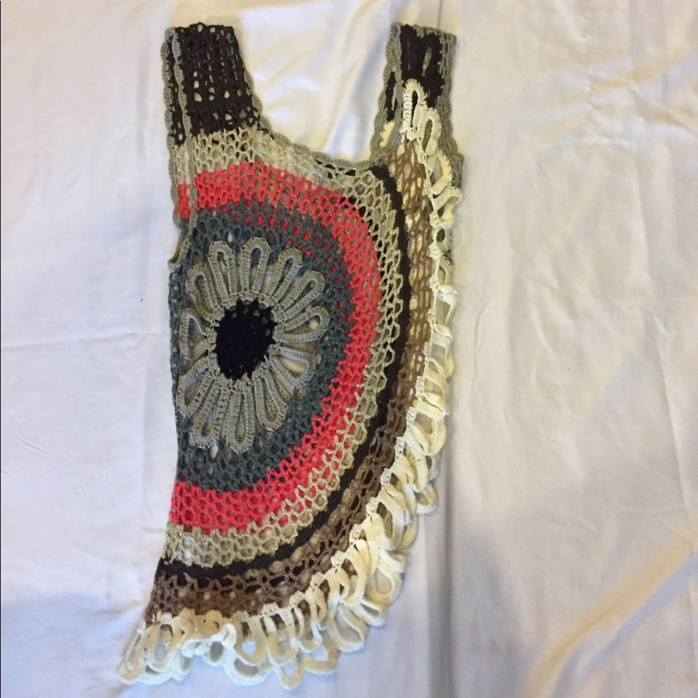 Crocheted tank top.