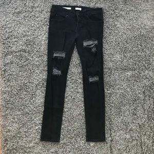 Distressed skinny jeans