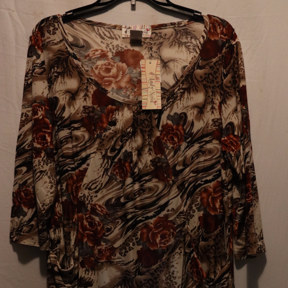 A white, beige, and brown tone tunic