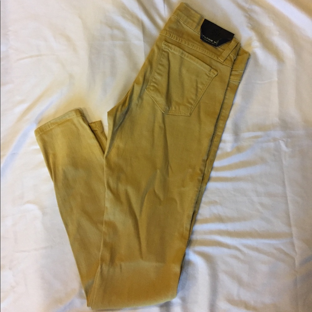 A mustard yellow/green skinny jean.