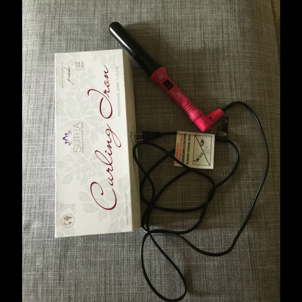 Pink and black sutra electronic hair curler