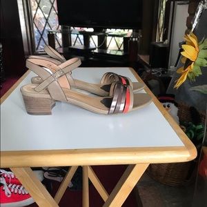 Orange and gray/silver Biala heels