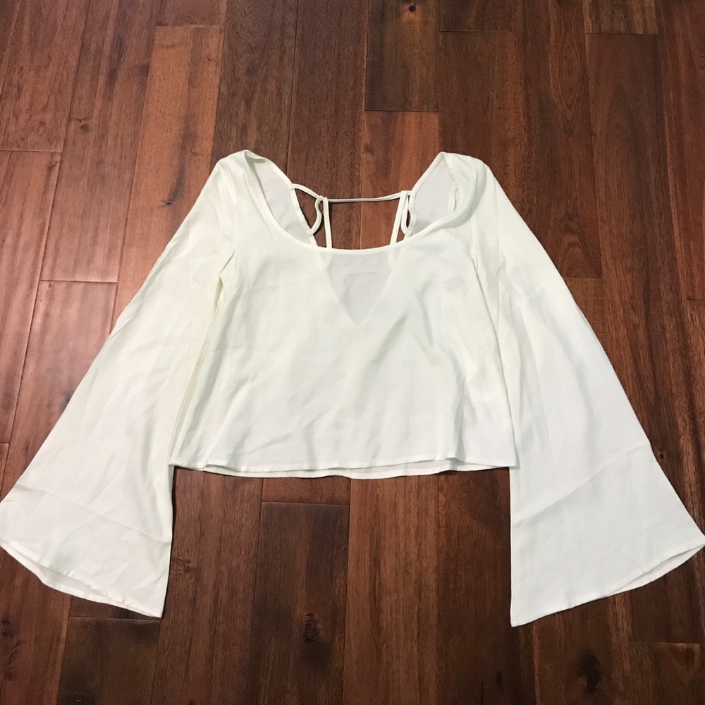 White trumpet sleeve crop top