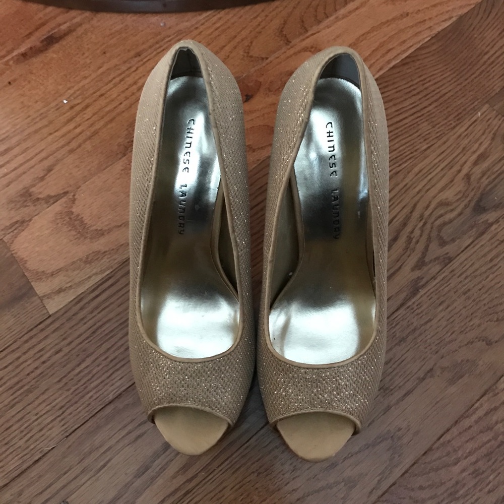 Platform Peep Toe Pumps.