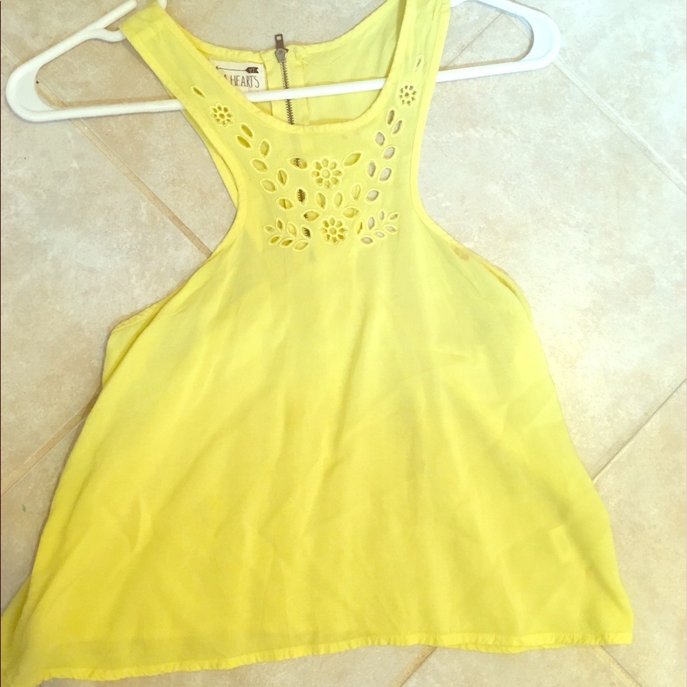 pac sun yellow crop top and zips down the back!