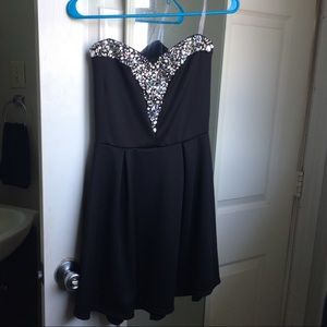 Black mid-length dress with rhinestones