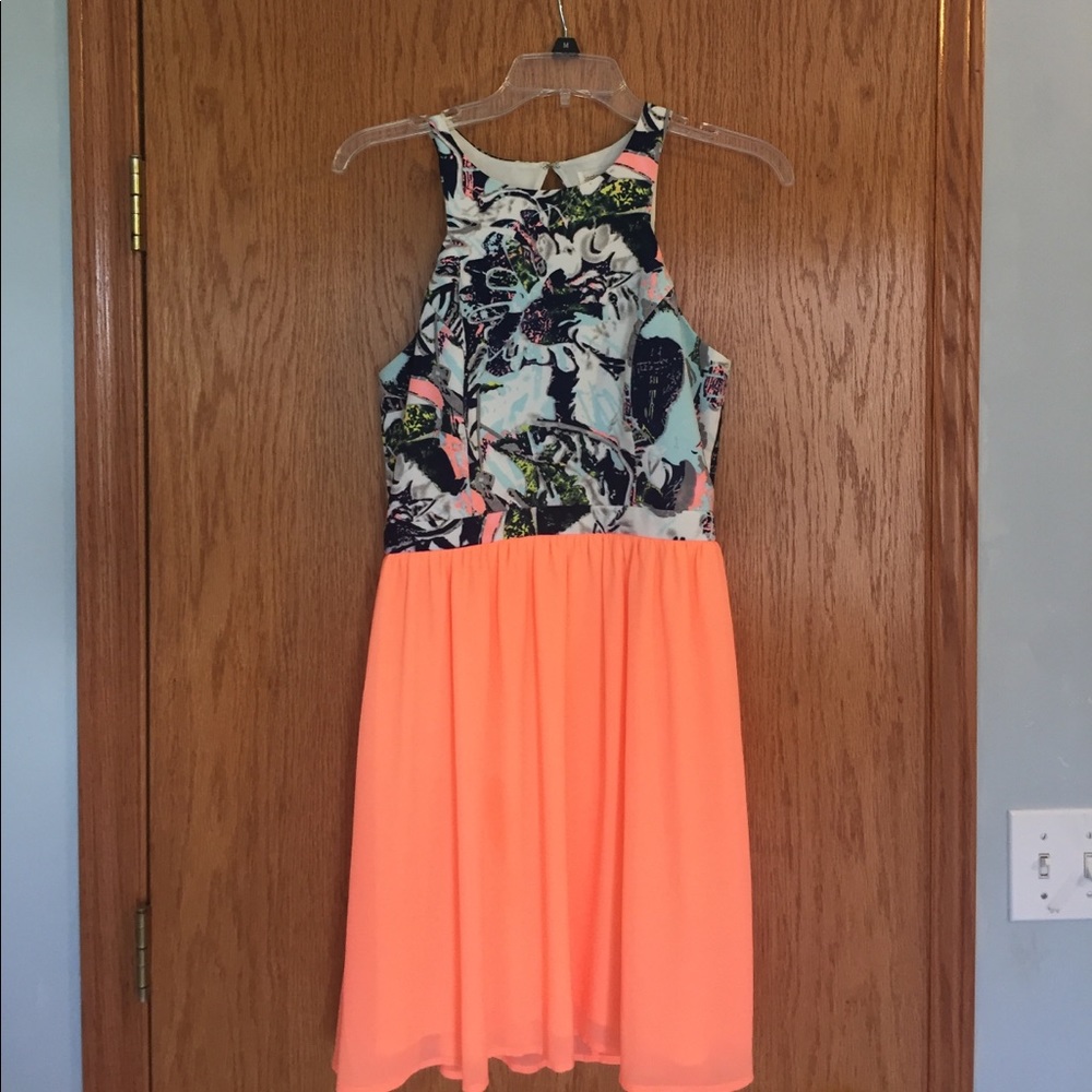 SUPER FUN, bright colored open back dress.