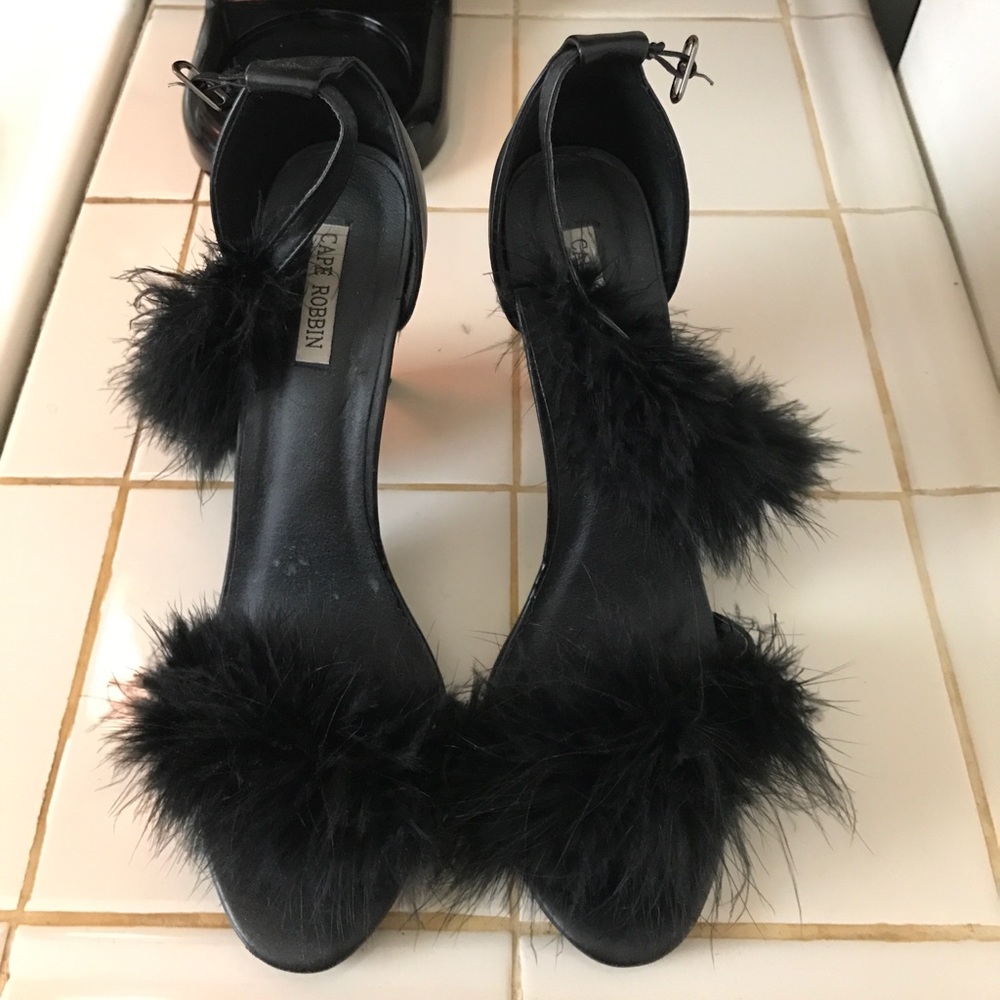 Sexy black strap heel sandal with feathers.