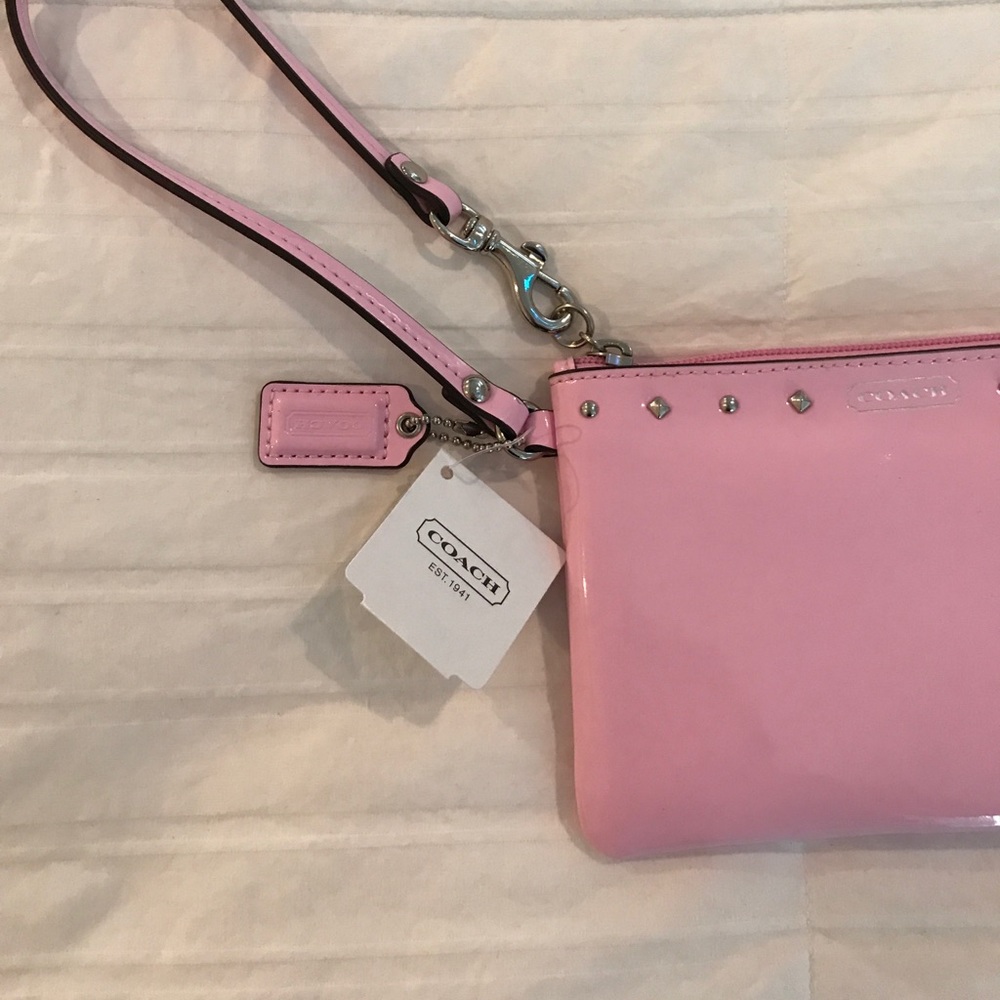 Coach studded liquid gloss wristlet (pink)