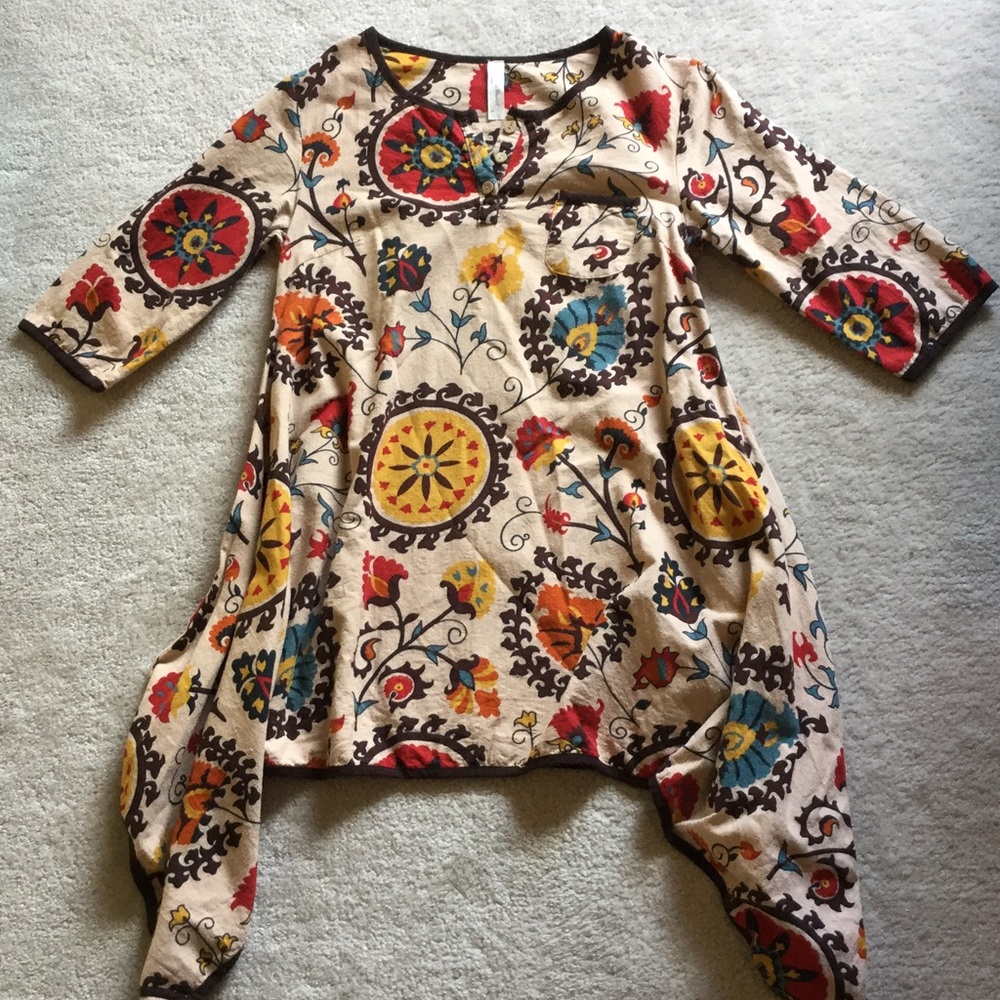 Shark bite hem tunic