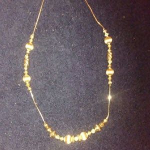 Gold necklace.