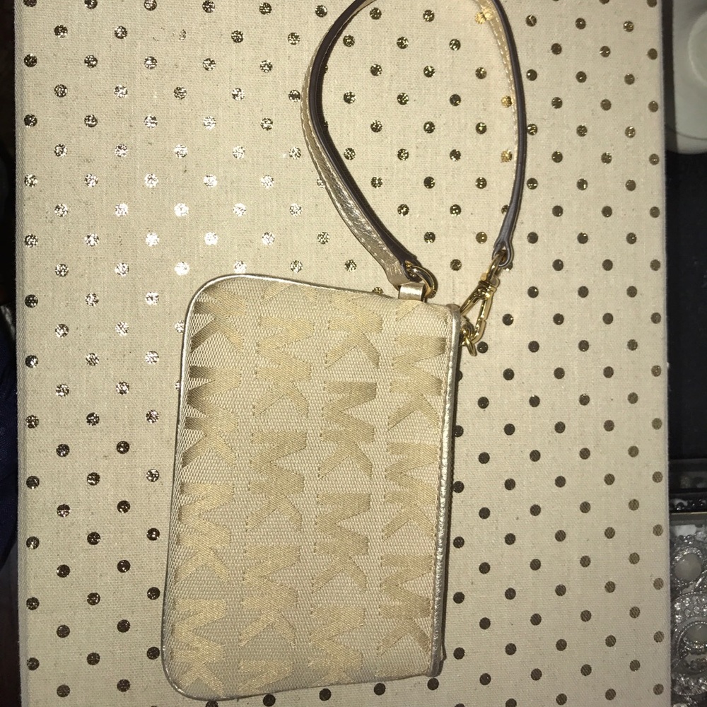 Michael Kors gold wristlet