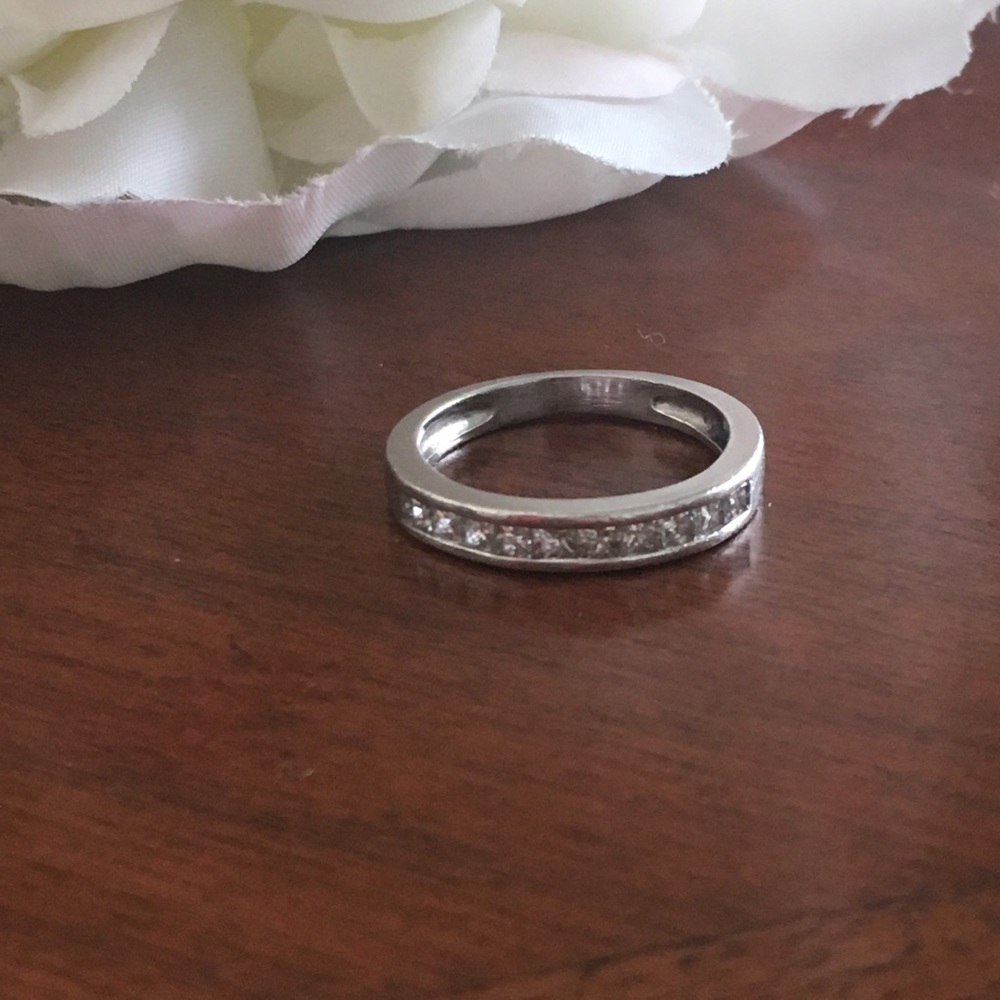 Platinum and Diamond princess cut channel set ring