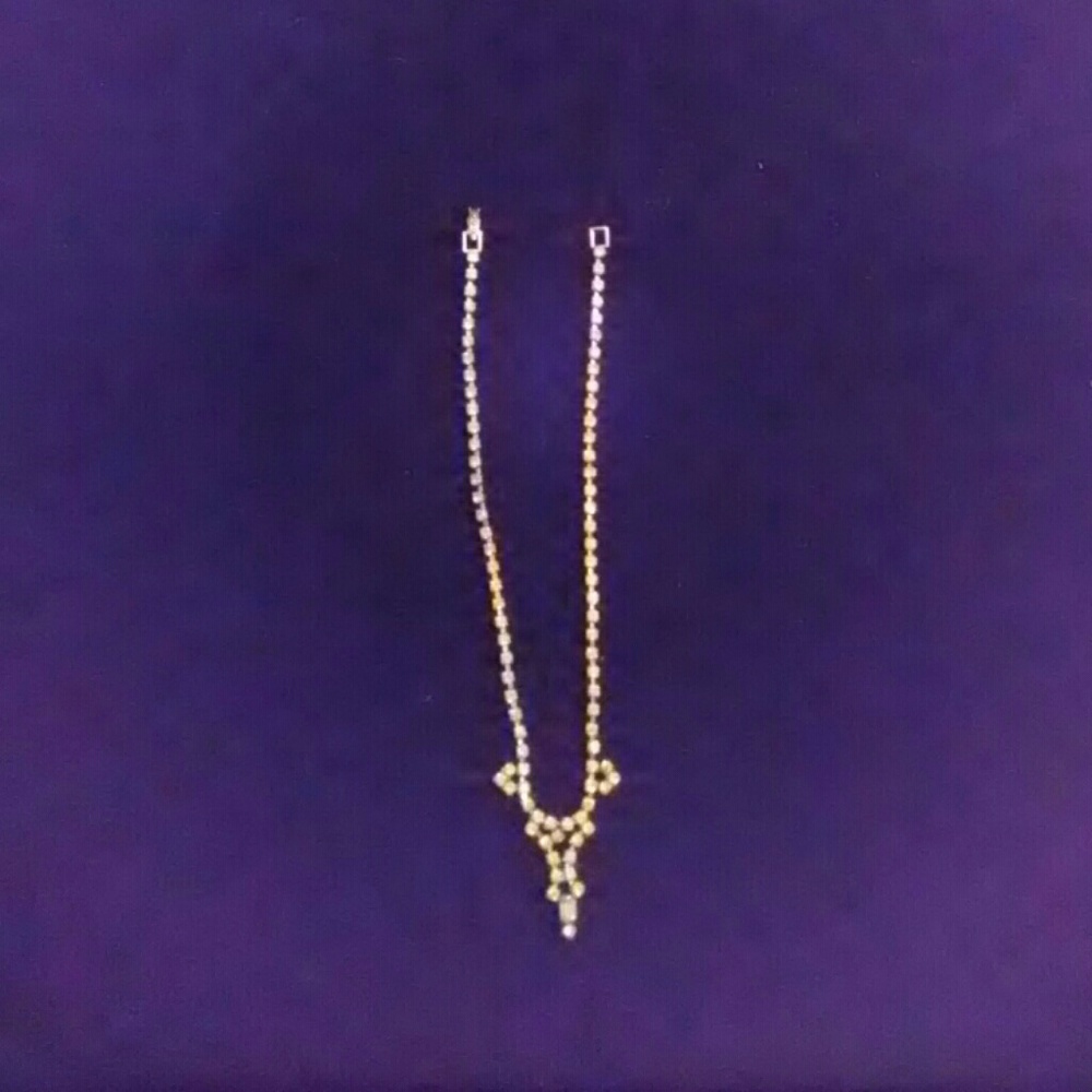 Diamond like stone necklace.
