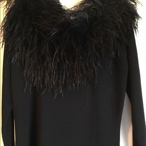 Sweater with ostrich feather