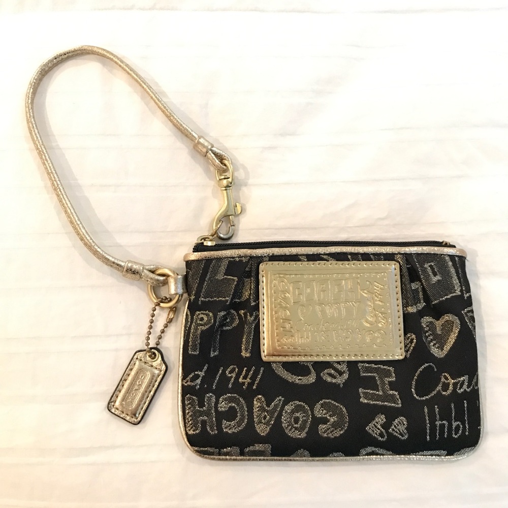 Coach Poppy Signature Wristlet in Black and Gold