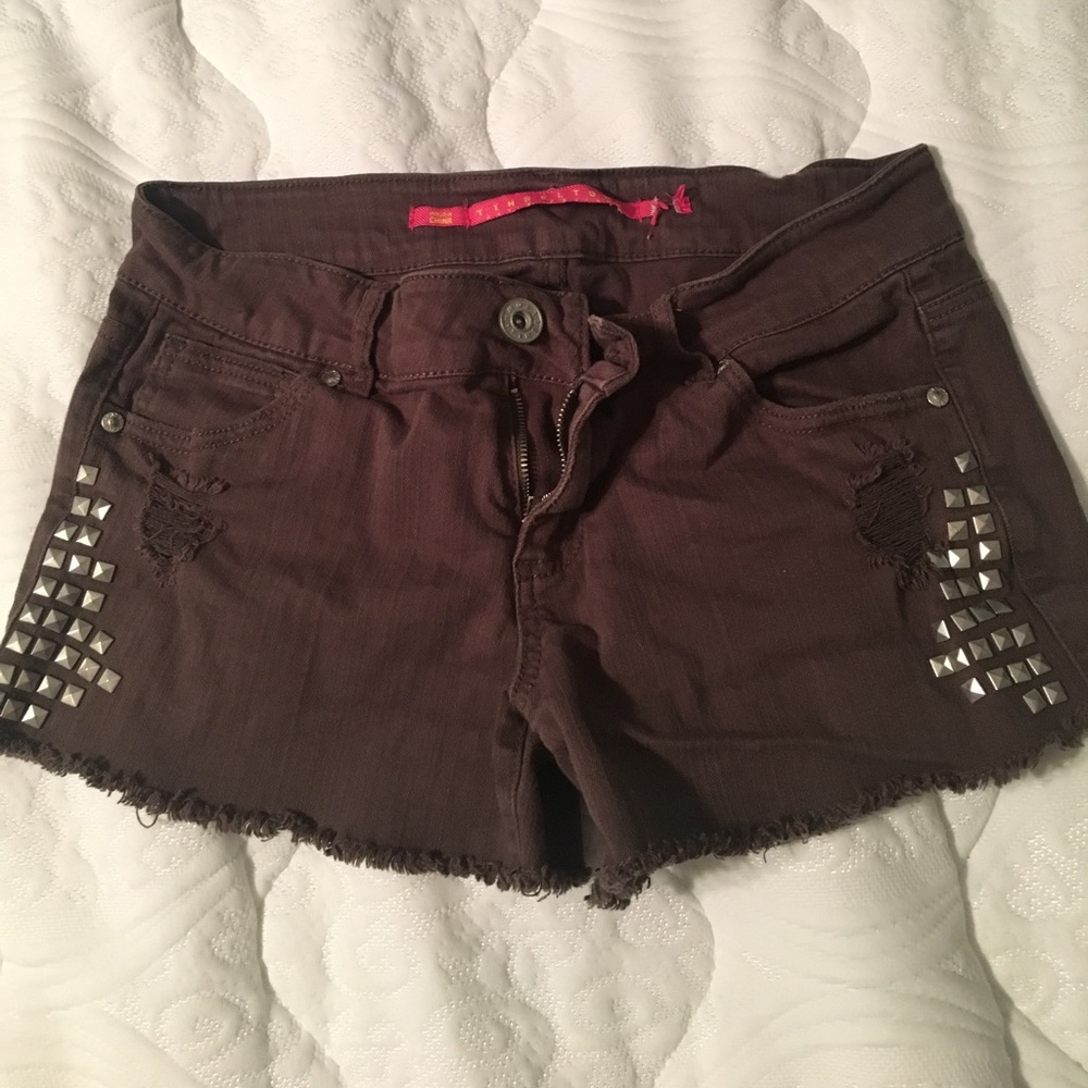 Distressed studded shorts