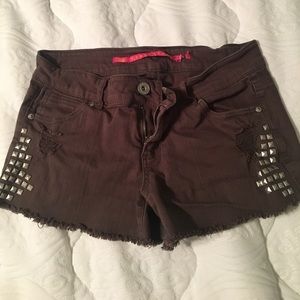 Distressed studded shorts