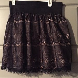 Cute mini skirt black overlay with pink slip under