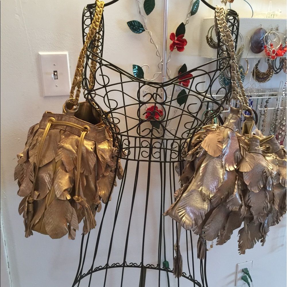 Fringe genuine leather Metallic hand bag