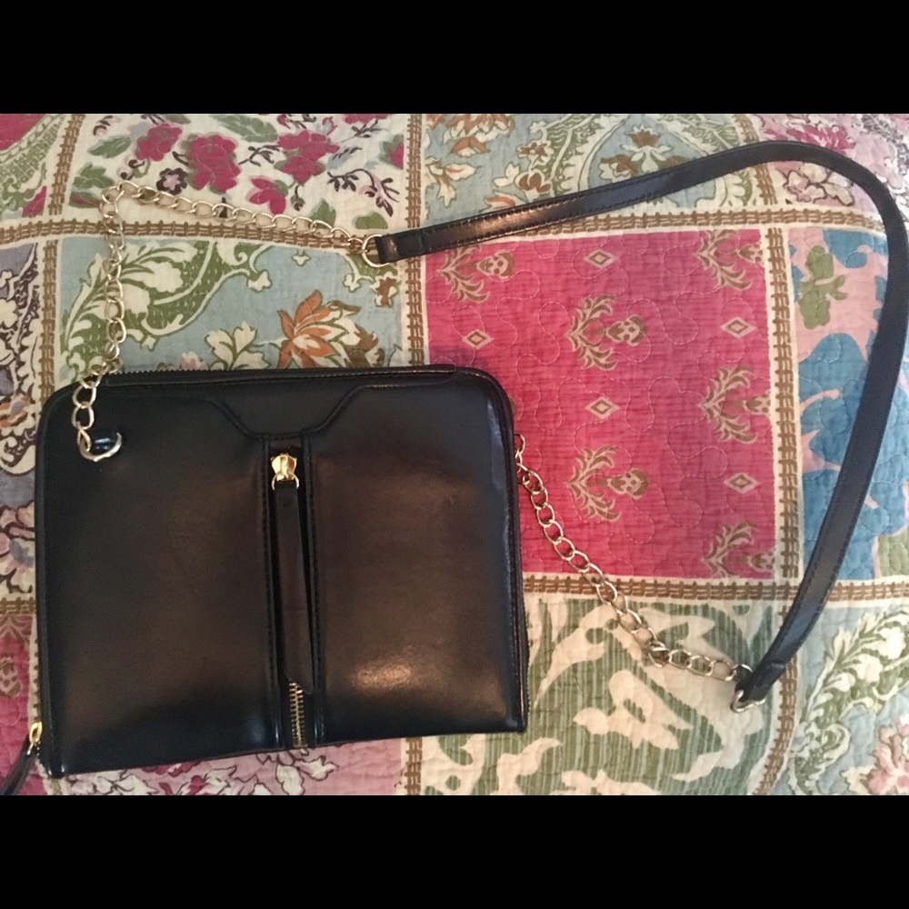Black with gold chain and pockets cross body