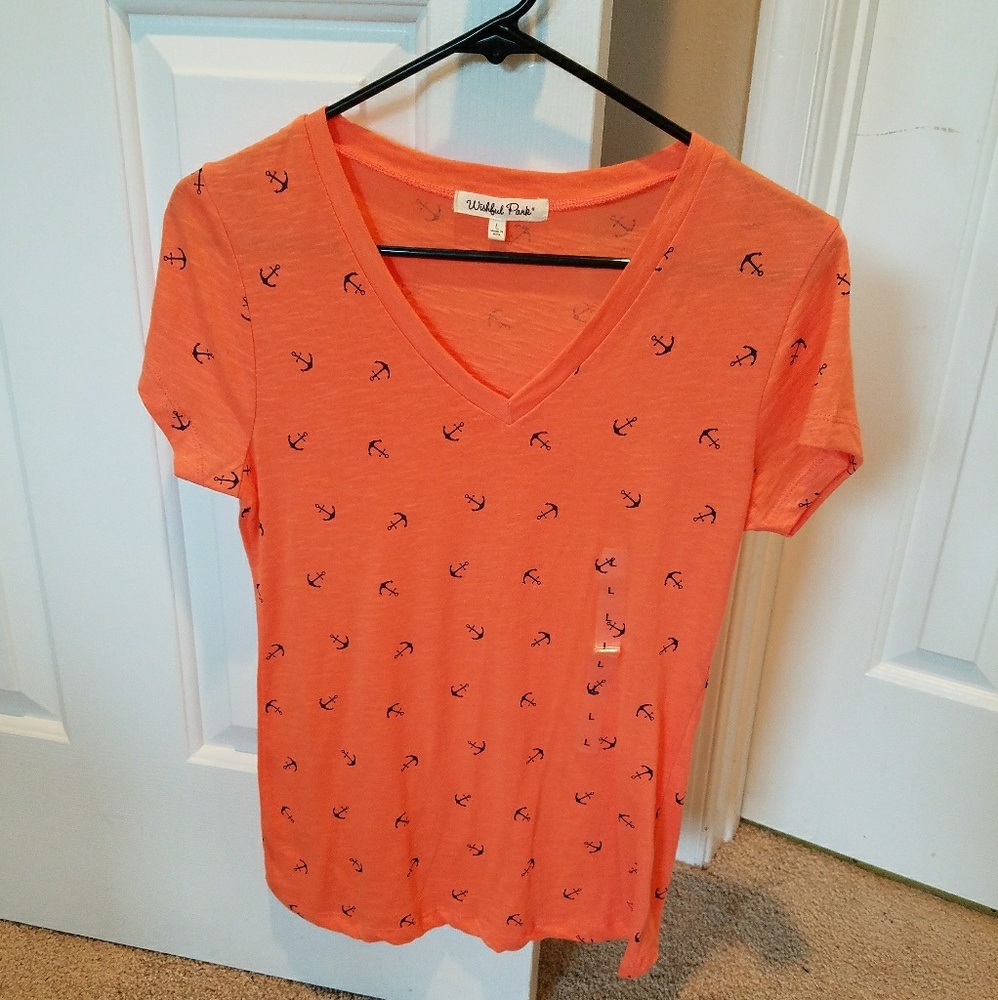 Peach color shirt with anchors