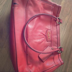 Beautiful orange/ red coach purse.
