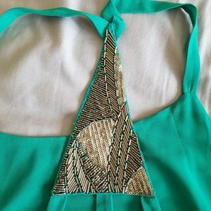 Halter top. Flowy material. Never worn