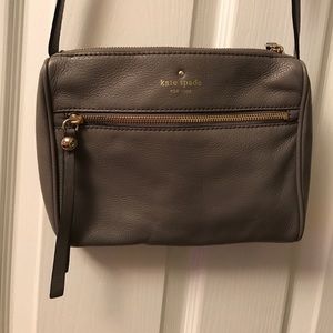 Small Kate Spade cross body purse, dark grey.