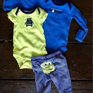 Infant outfit. Two onesies and one pant.