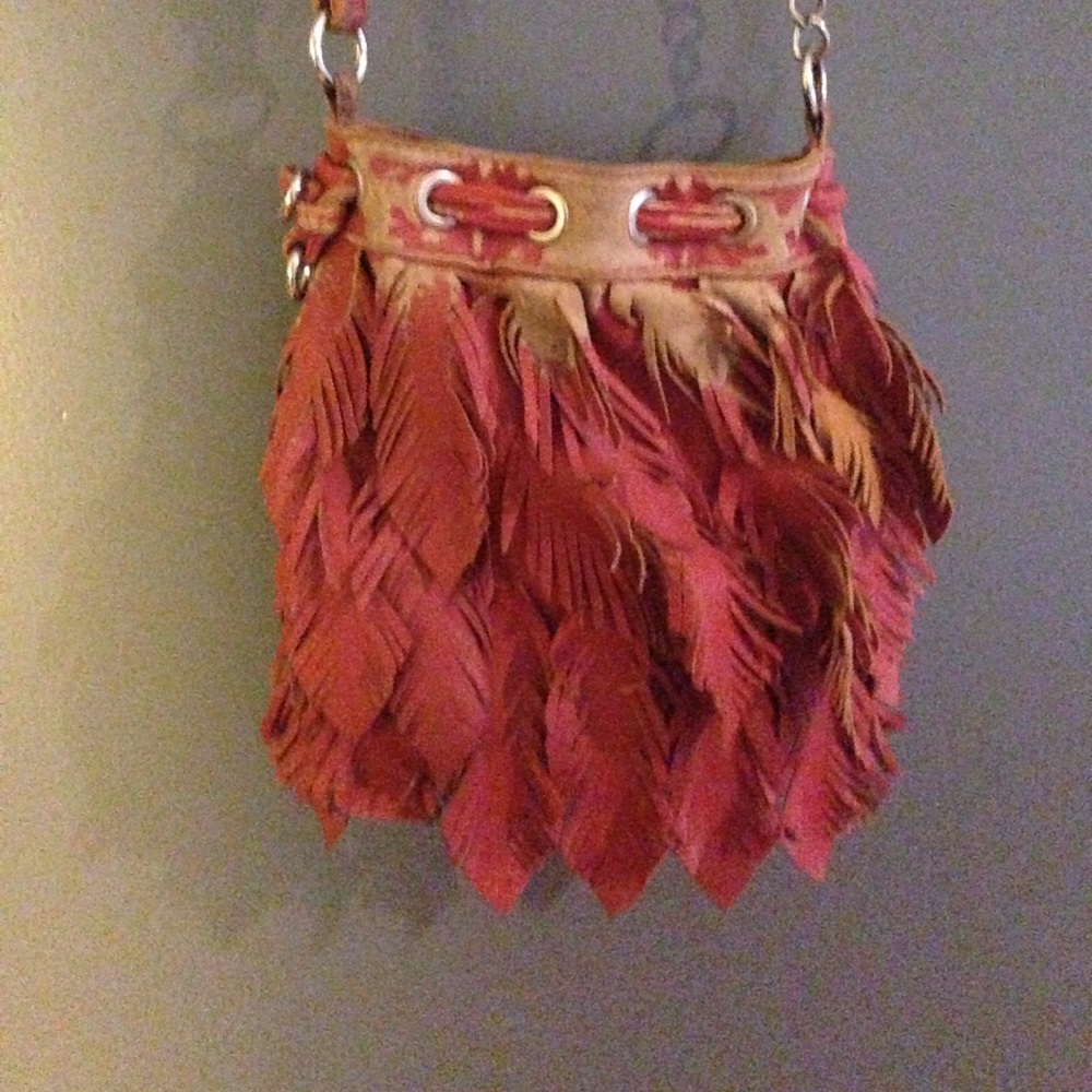 Carlos Santana designer purse orange feathers