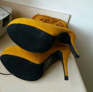 Mustard color fringe boots