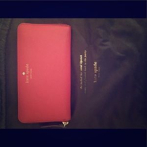 Red Kate spade wallet. Perfect condition