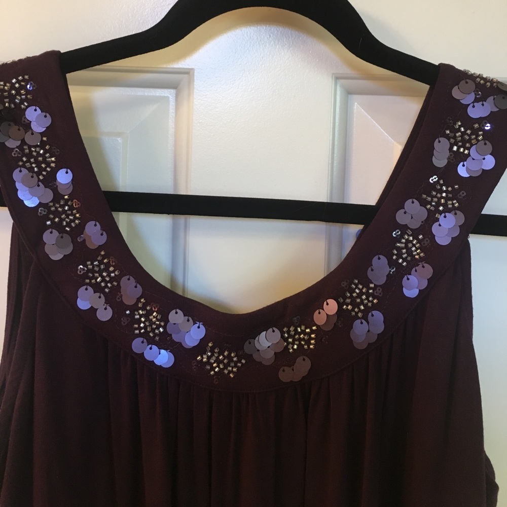 Blouse with sequined neckline