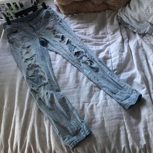 Light wash mid-rise distressed jeans