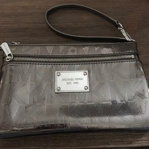 Large Michael Kors wristlet.