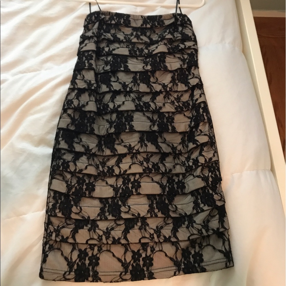 Black and nude strapless dress
