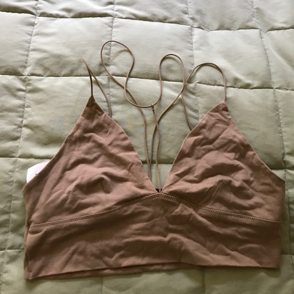 Size large nude colored strappy bra top.